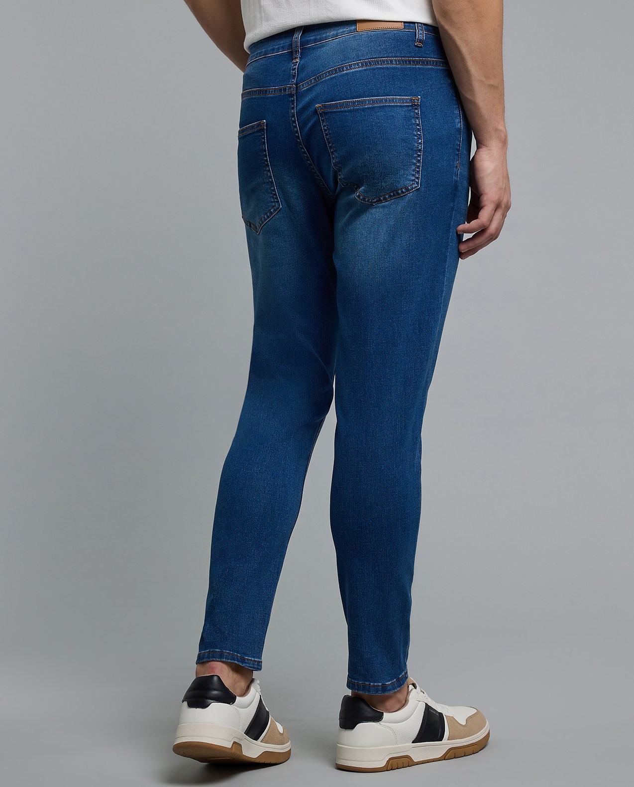 Faded Slim Fit Jeans with Button Closure