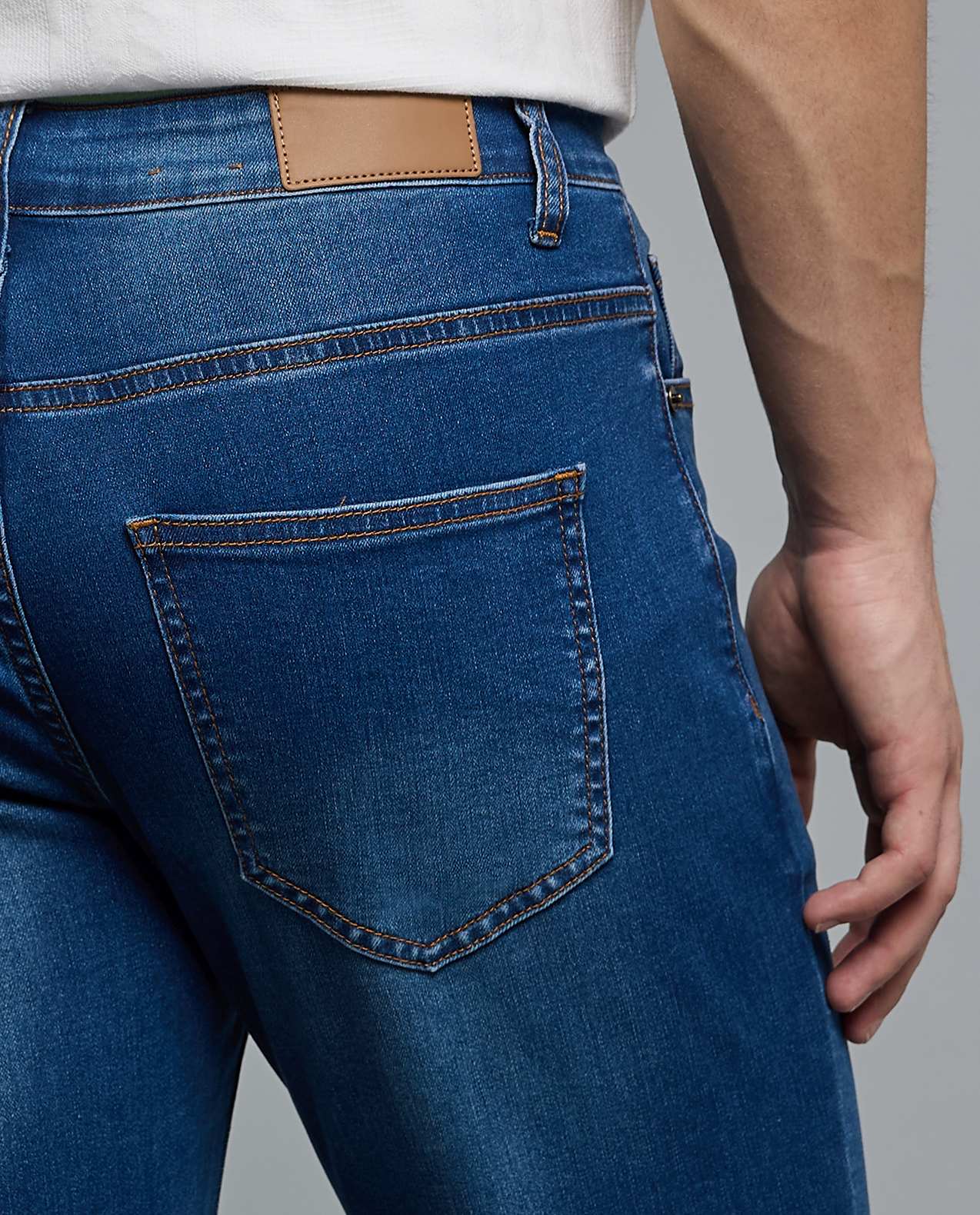 Faded Slim Fit Jeans with Button Closure